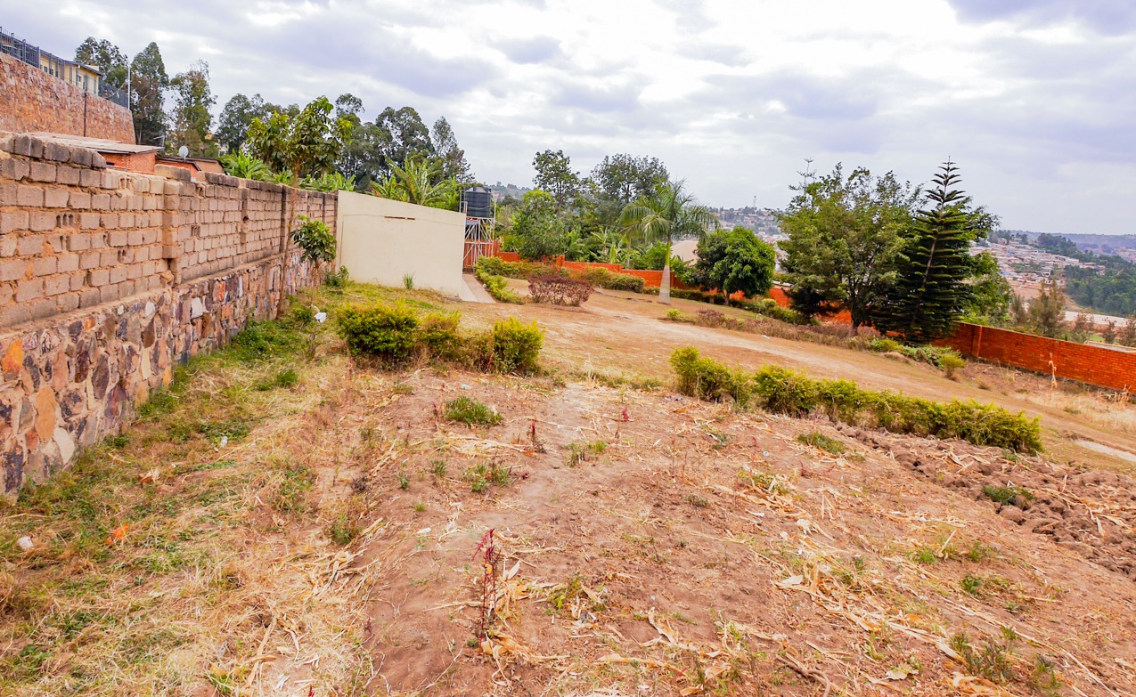 DB 087 Gacuriro Gacuriro-Kagugu Very nice flat fenced plot for sale in Kigali Rwanda.